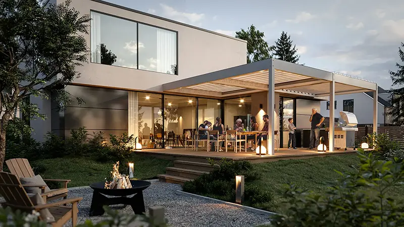 FLEDMEX® Lamellendach als moderner, beleuchteter Außenbereich an einem Sommerabend, während mehrere Personen gemeinsam grillen und die Zeit unter der Terrassenüberdachung genießen.